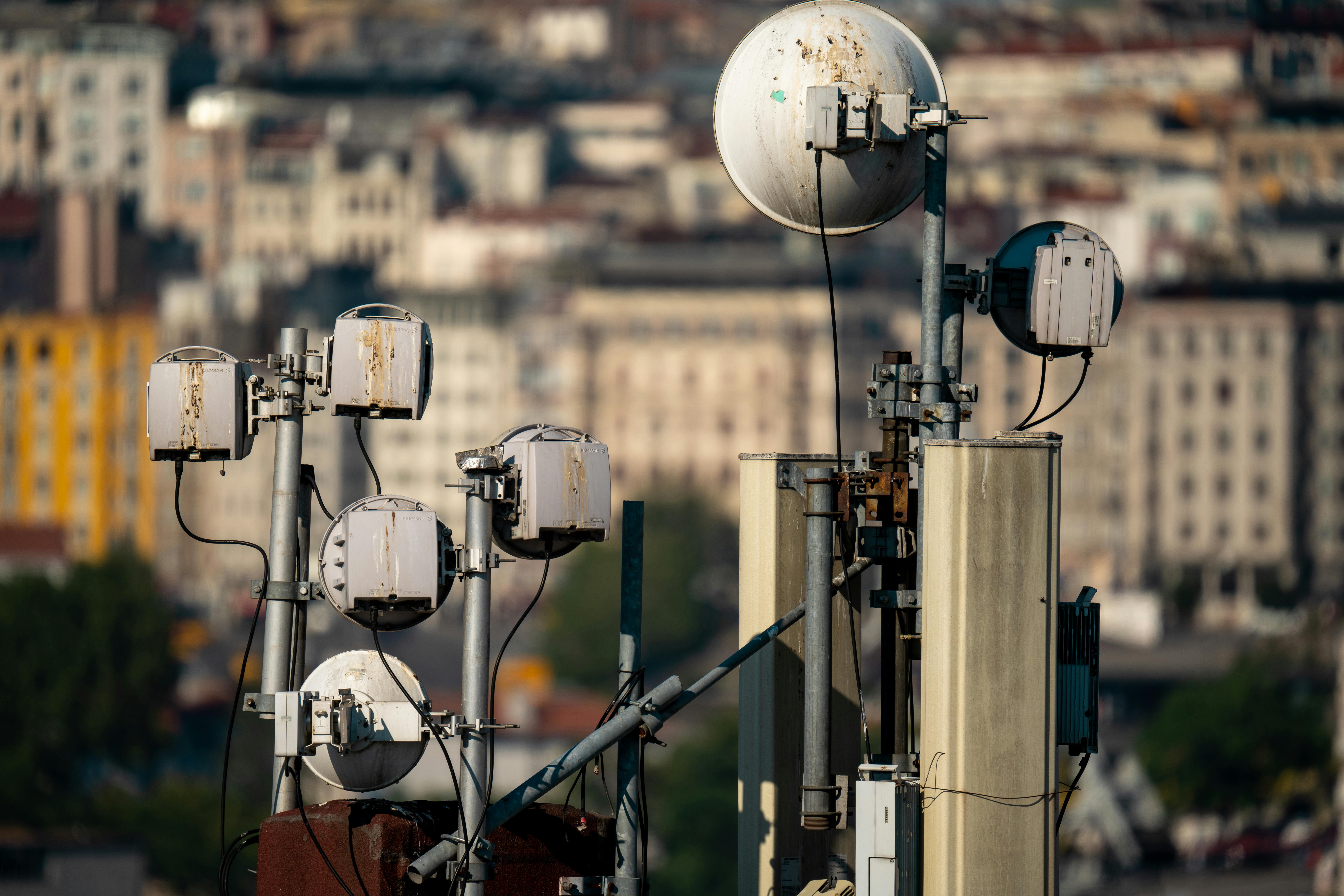 Telecommunication antennas on a rooftop in Istanbul, showcasing modern urban infrastructure.