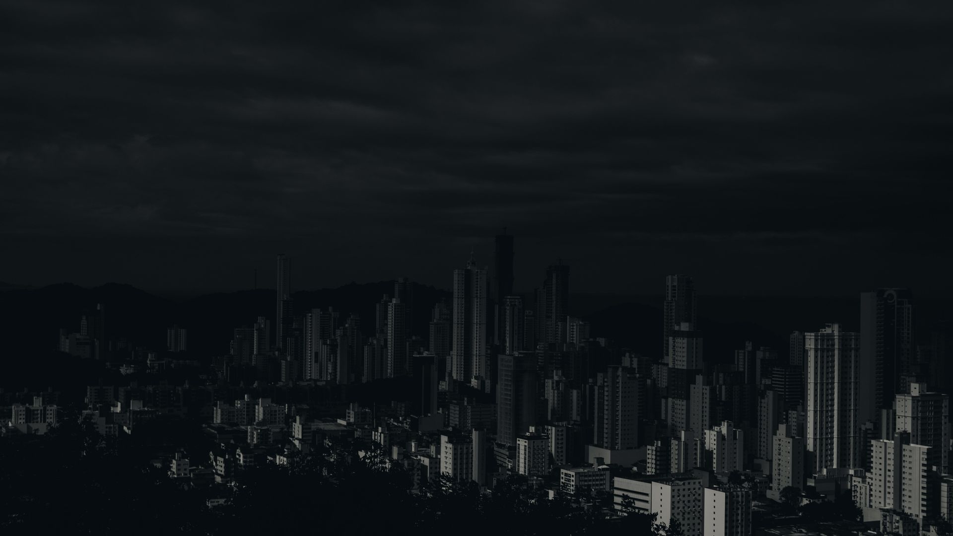 Modern city skyline at dusk representing professional business consulting