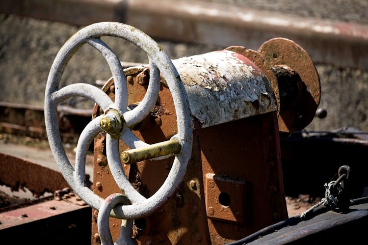 Rusty Steering Wheel Of Machine