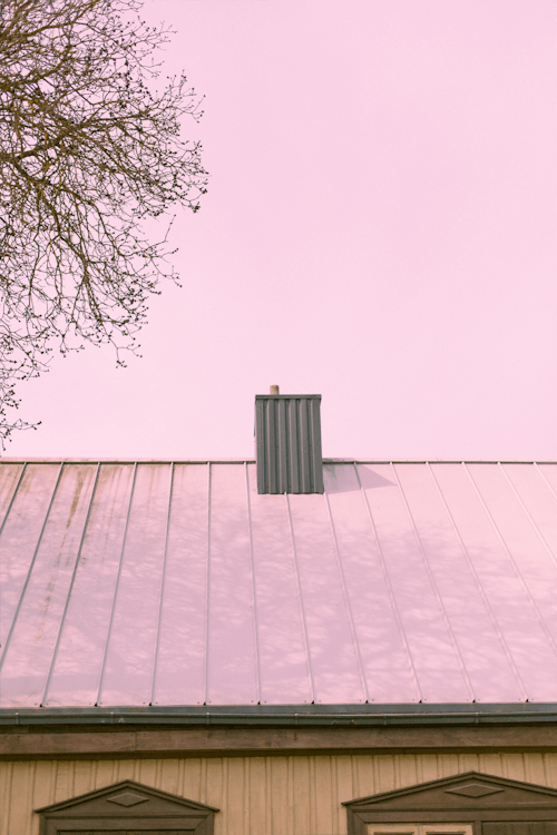 Modern Chimney and Roof on Wooden House