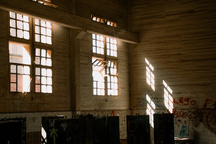 Sunlit Windows And Shadows In Abandoned Interior