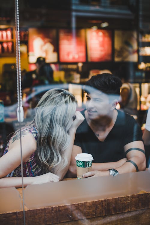 Free Photo of Couple Inside the Coffee Shop Stock Photo