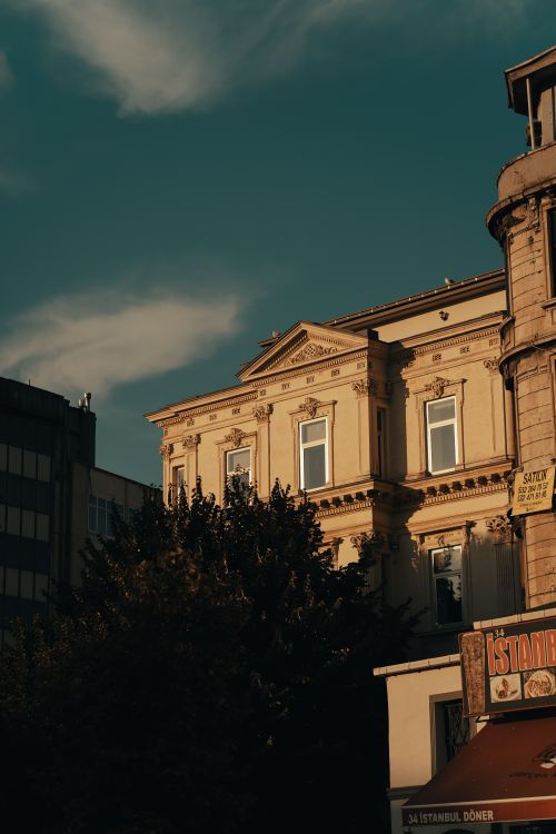 Free A stunning architectural building in an urban Turkish setting during sunset, with rich warm tones. Stock Photo