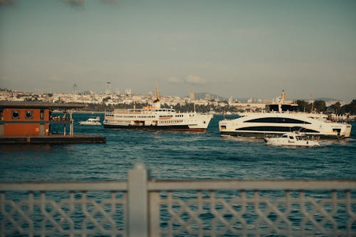 Ships Sailing along Waterfront on Bosporus
