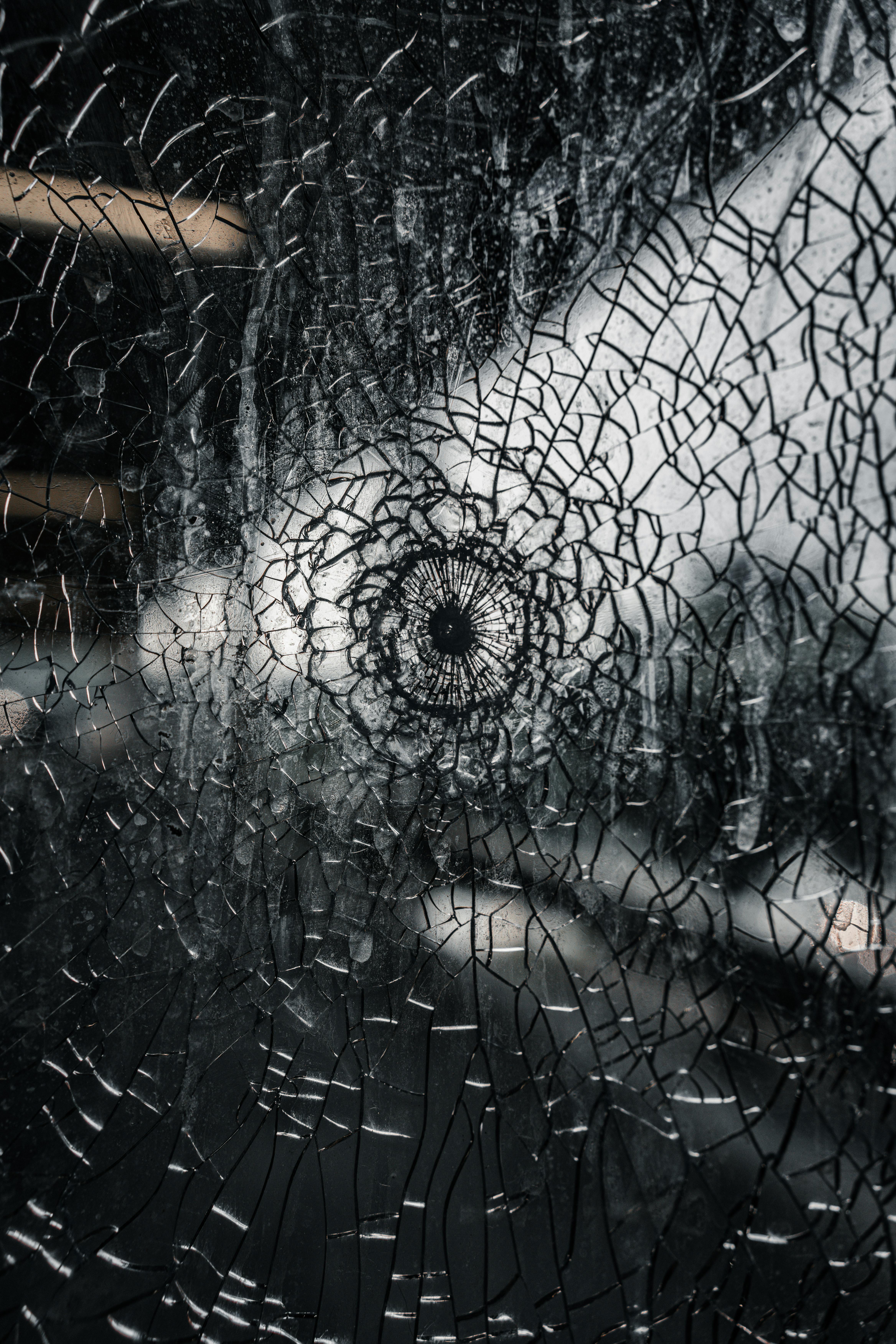 Broken Clear Glass Pieces on Black Surface · Free Stock Photo