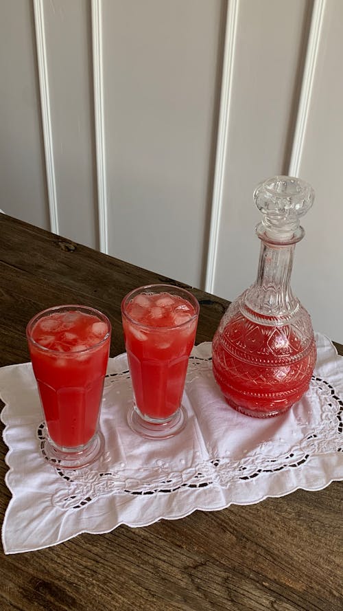 Fresh, Red Juice in Glasses and Pitcher