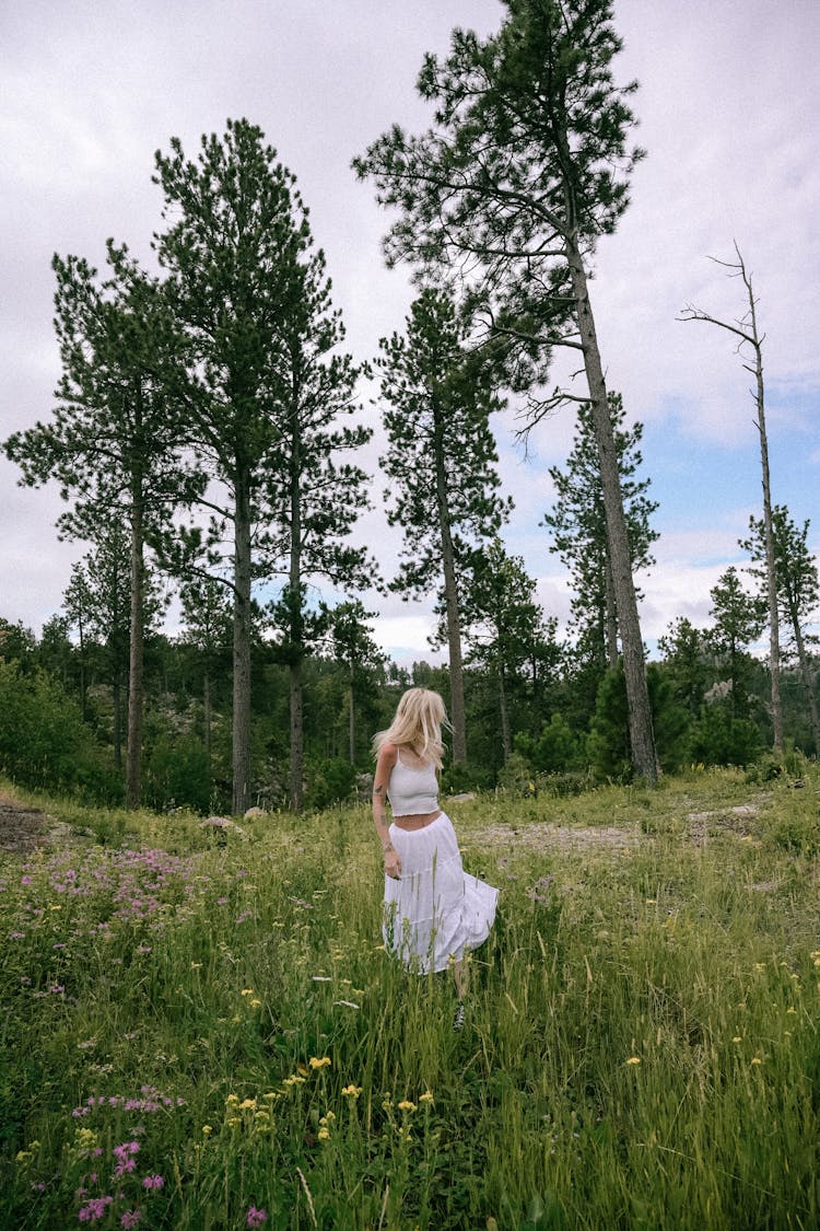 Woman Posing Among Grass