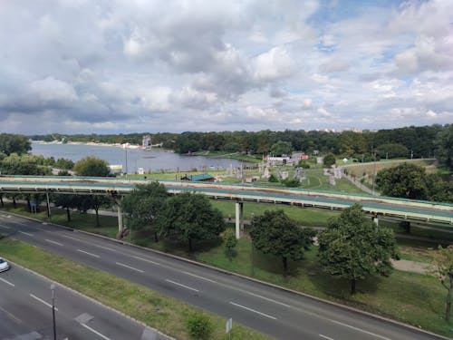 Highway Overpass and Lake at City Outskirts