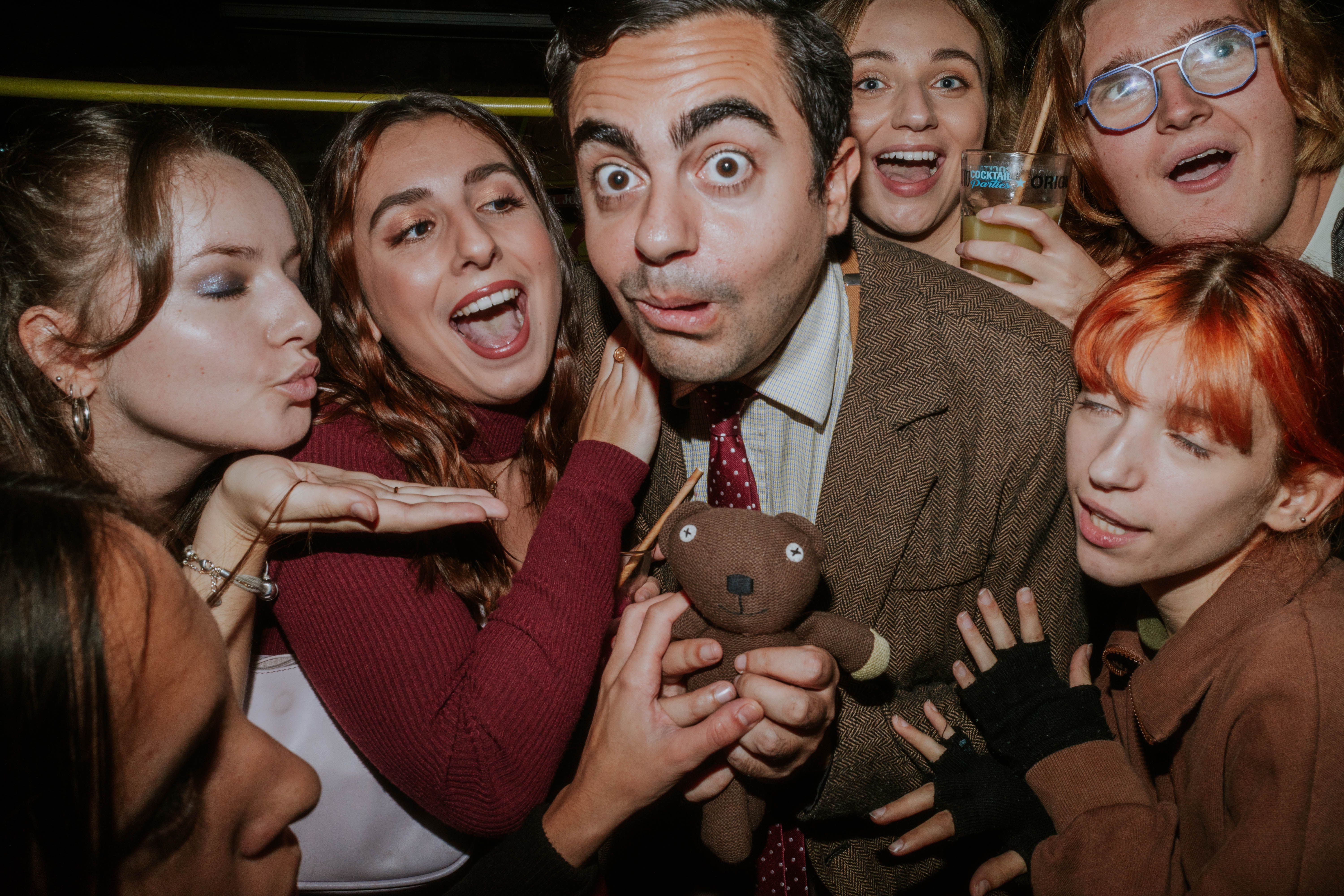 Mister Bean with Teddy Bear and Fans · Free Stock Photo