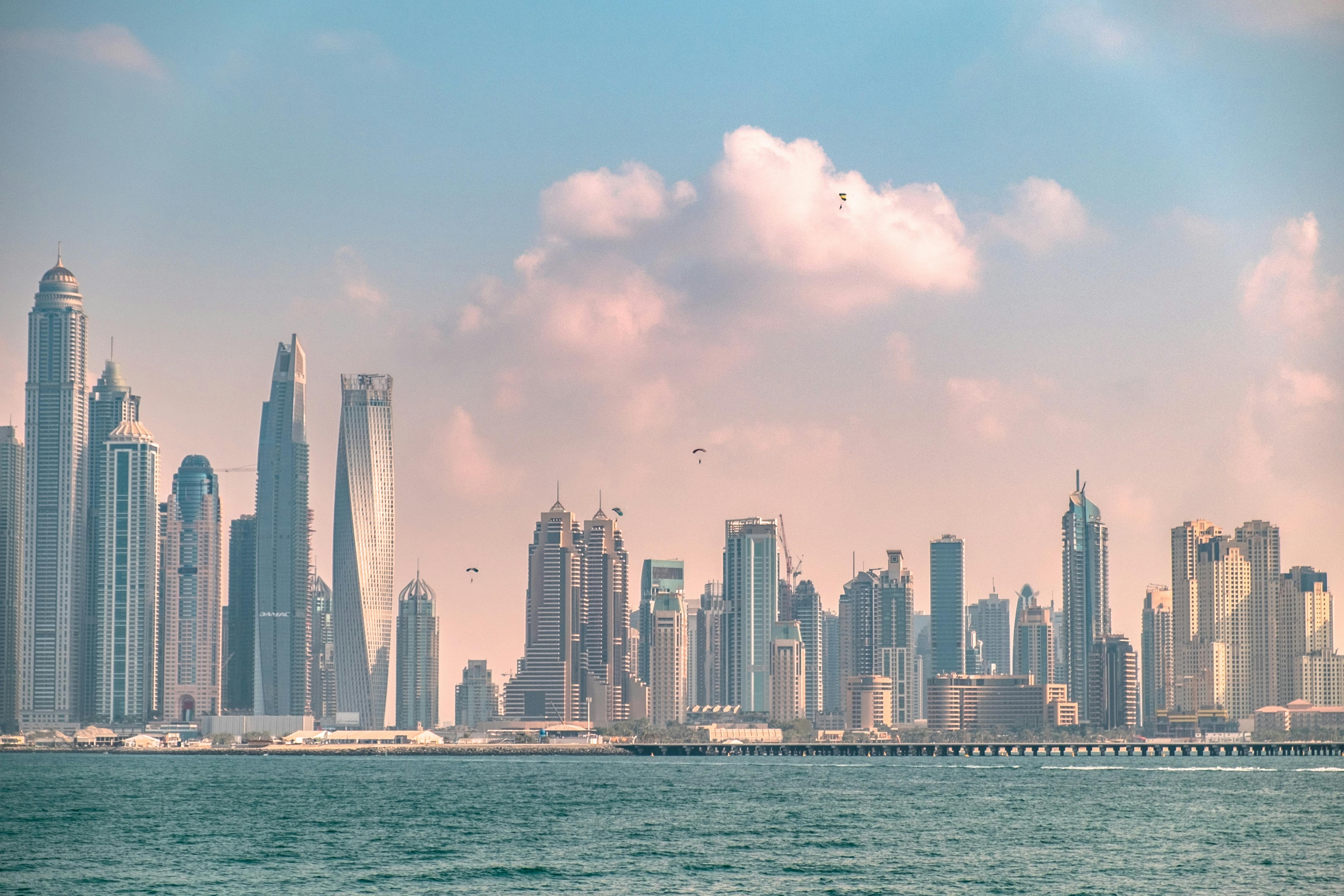 skyscrapers on sea shore in dubai