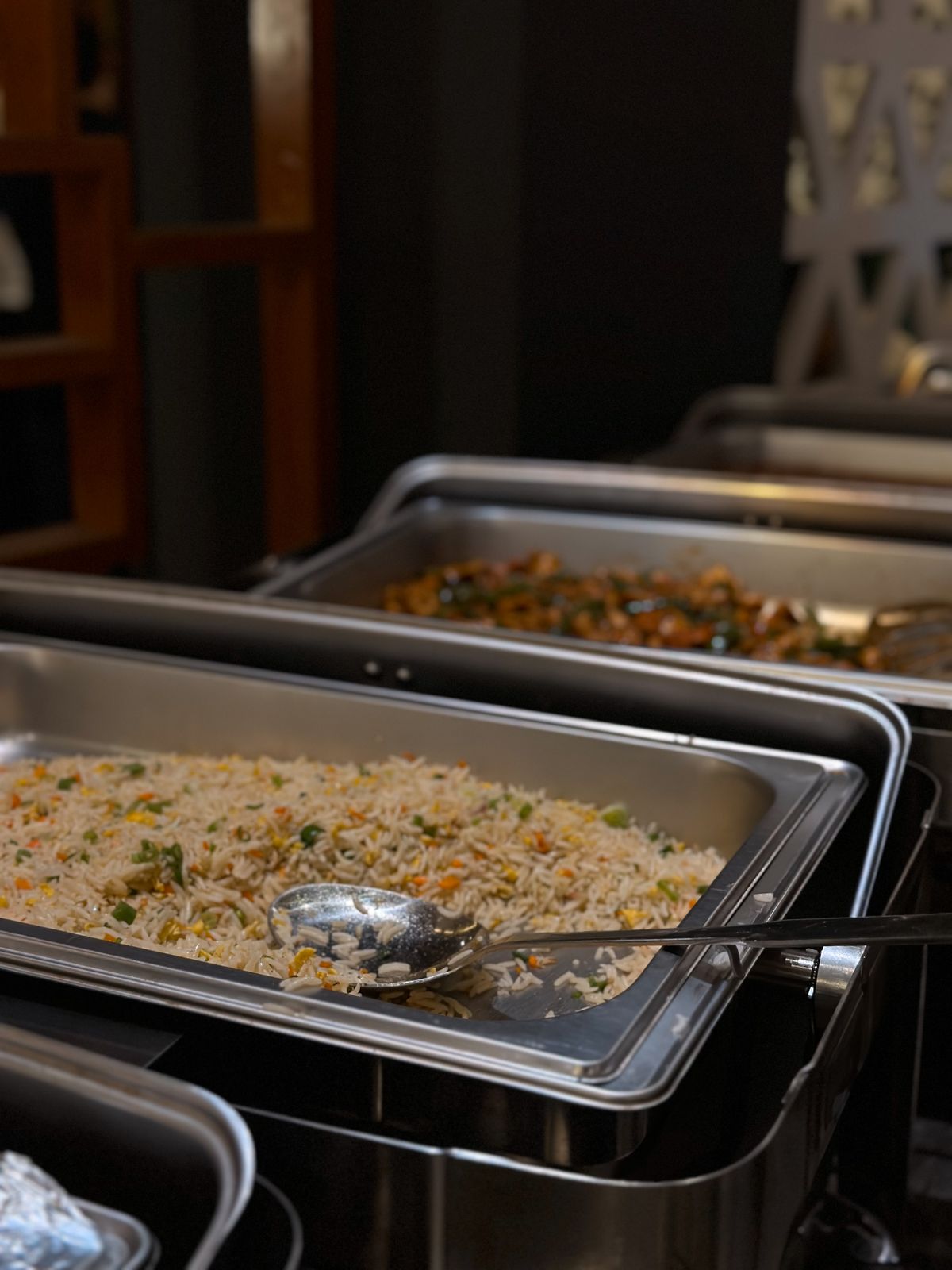 Catering trays of rice in the kitchen