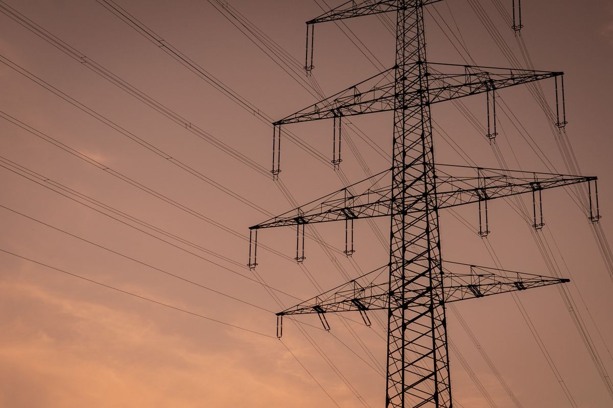 High Voltage Transmission Towers at Sunset · Free Stock Photo