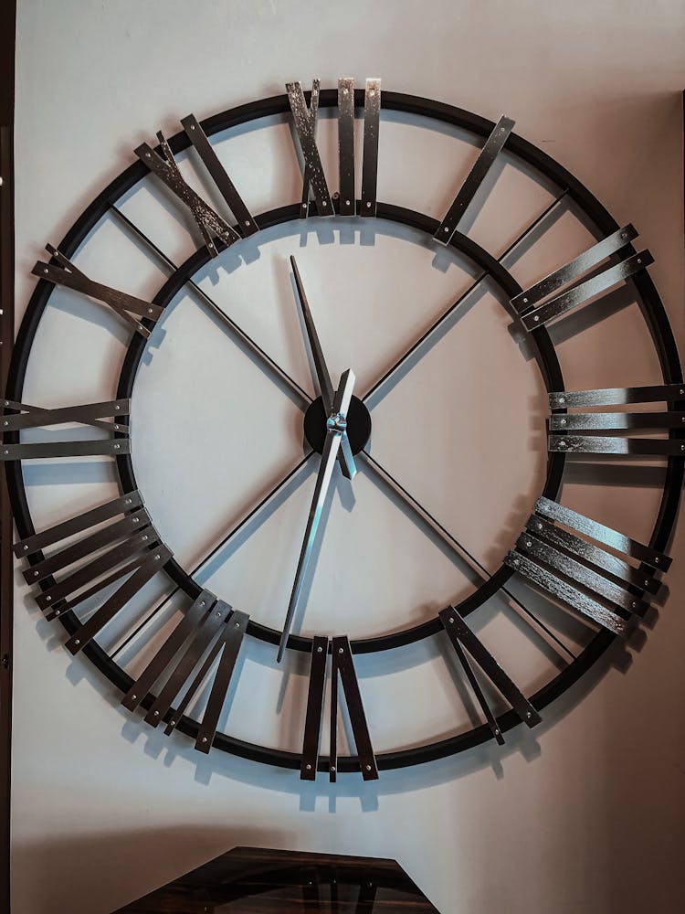 Close-Up Photo Of Clock Hanging On A Wall
