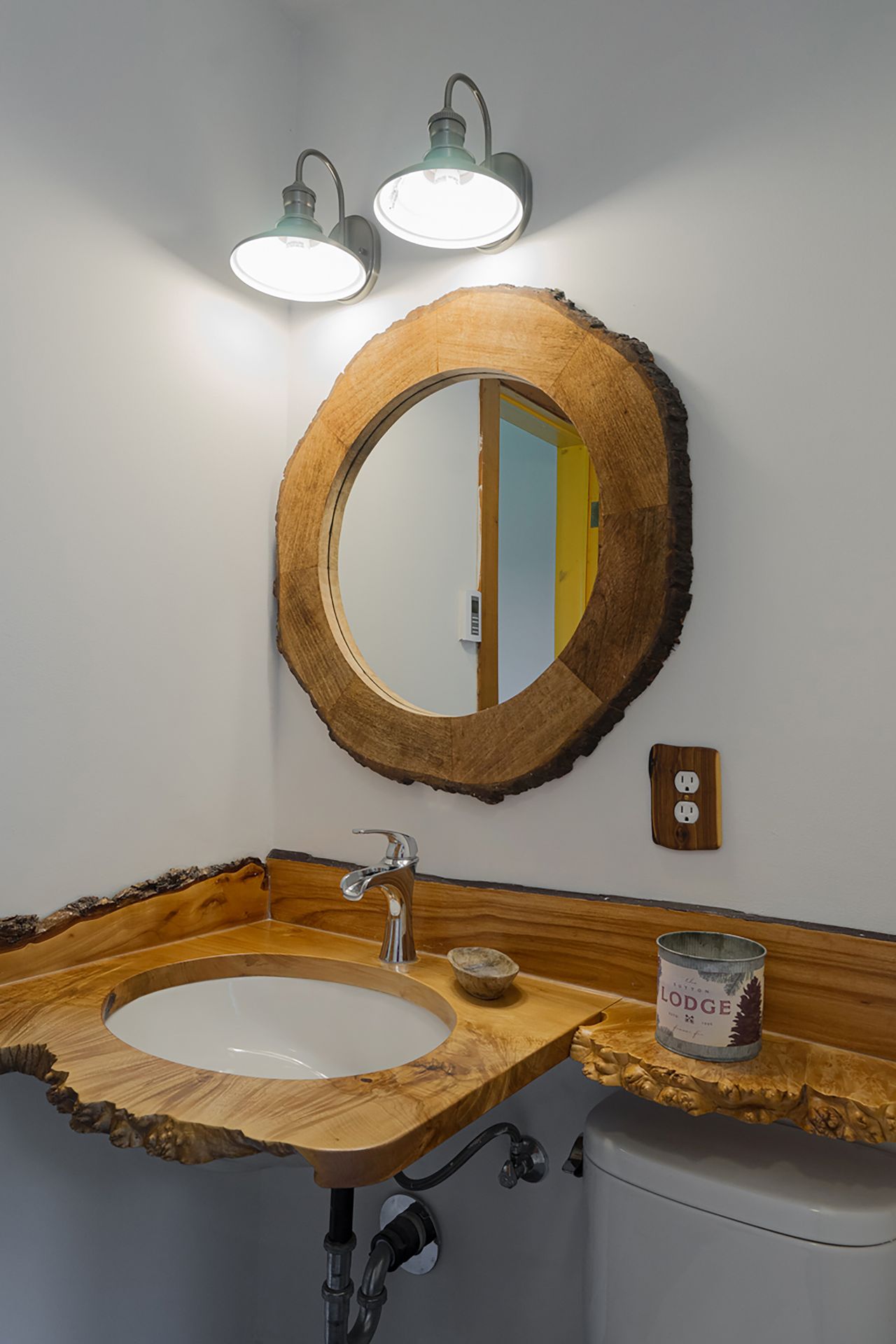 vintage-dresser-bathroom-vanity Rustic wooden bathroom vanity with vessel sink and plants