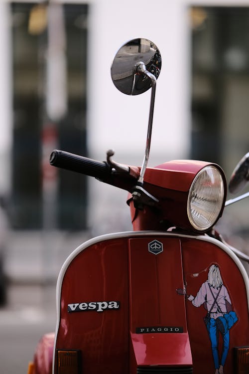 Close-up of a Red Vespa Motor Scooter 