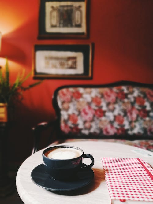 Close-up of a Cup of Coffee Standing on a Table 