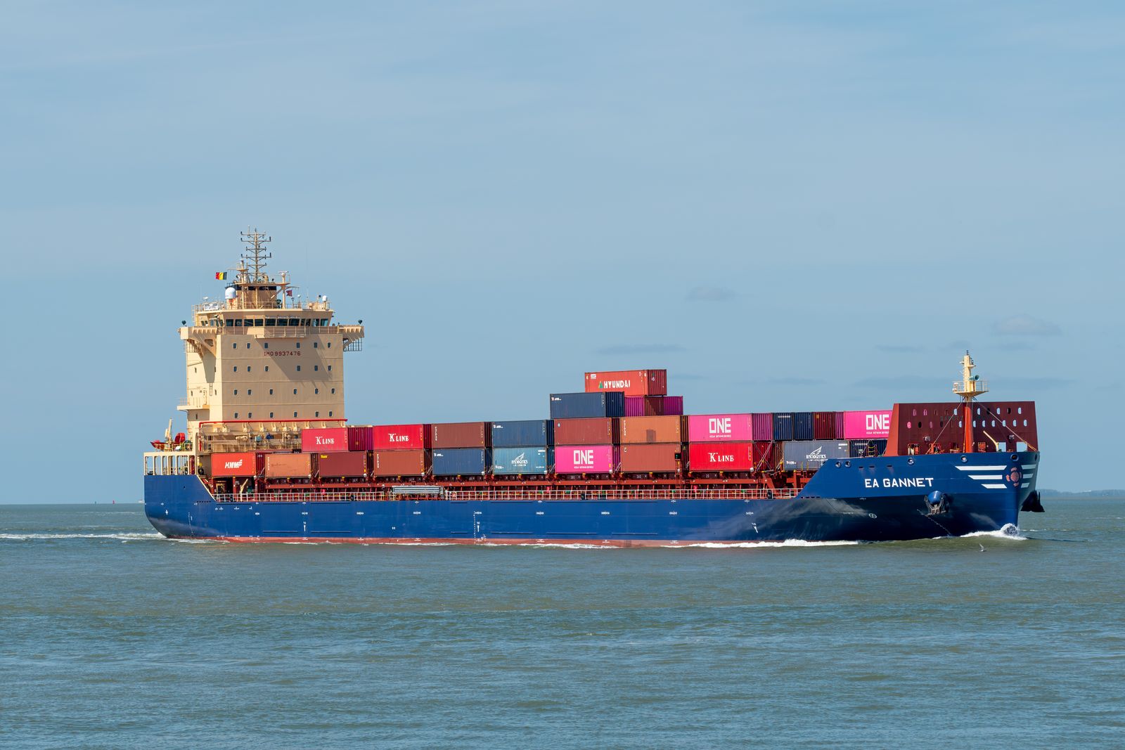 Container ship sailing across the open sea