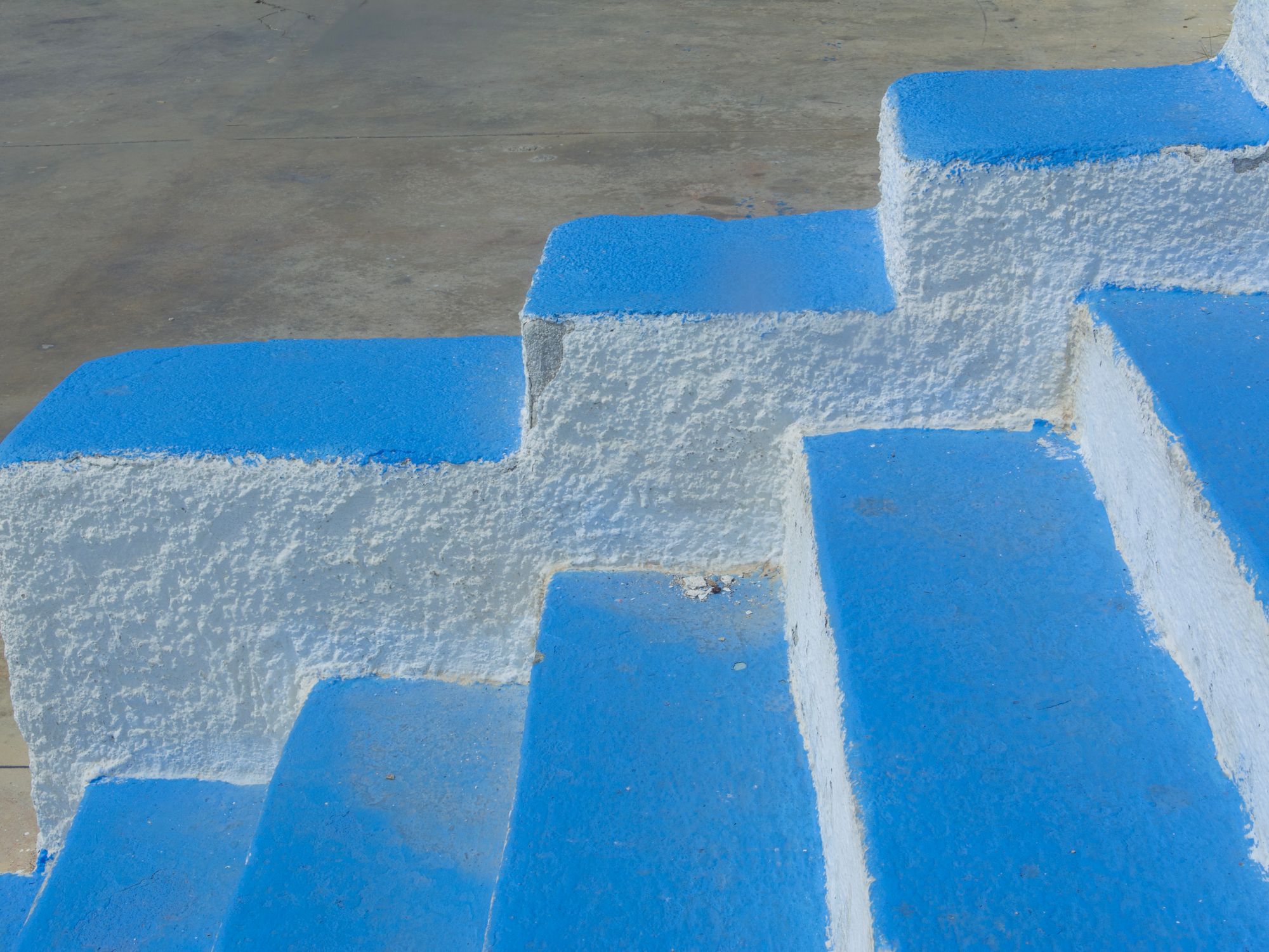 Masonry and Render Painting in Kensington, Kensington and Chelsea — professional painter and decorator at work
