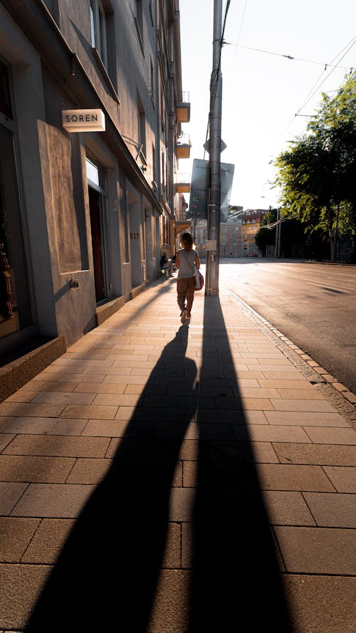 Shadows on the Sidewalk at Sunset