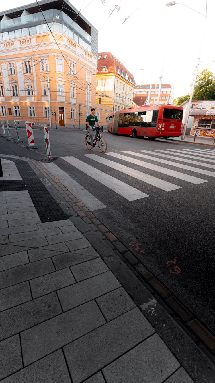 Man Riding Bike On Street