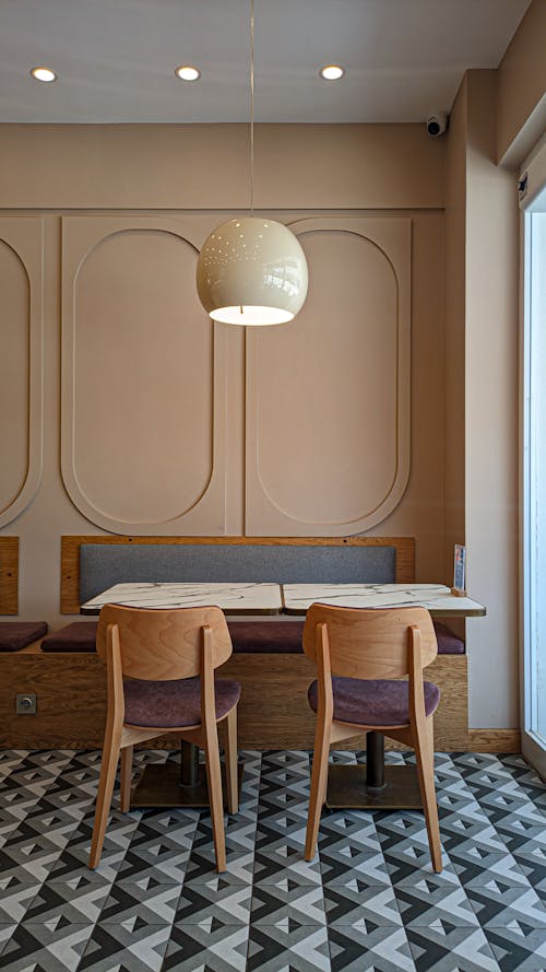 Empty Tables Inside a Modern Cafe 
