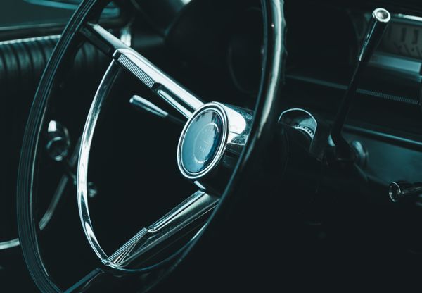 Steering wheel of a classic car — photo by Chris F on Pexels