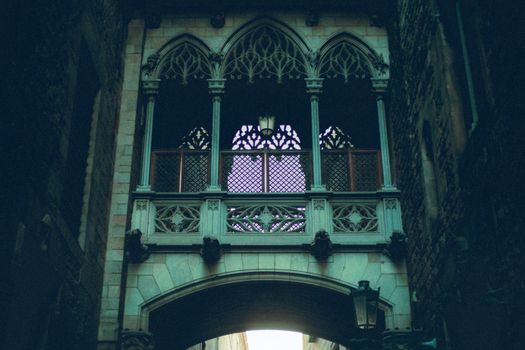 Explore the intricate gothic architecture of Barcelona's historic archway.