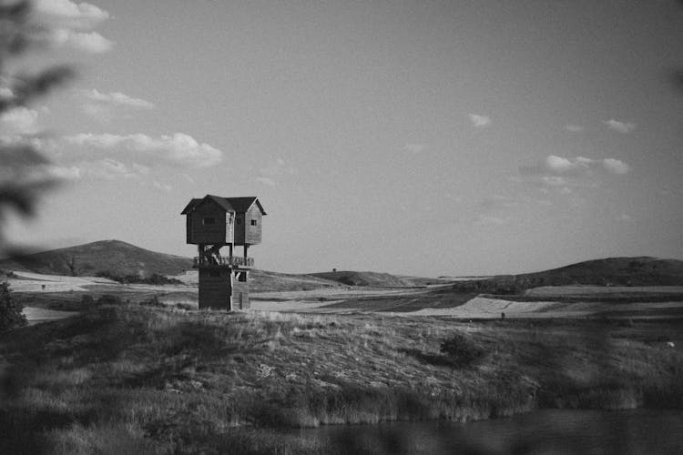 Baba Yaga House In Hilly Landscape