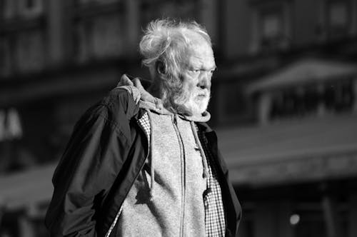 Elderly Man in Jacket and Hoodie