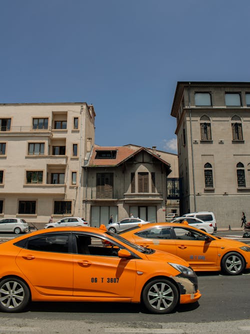 View of Yellow Taxis on a Street in City 