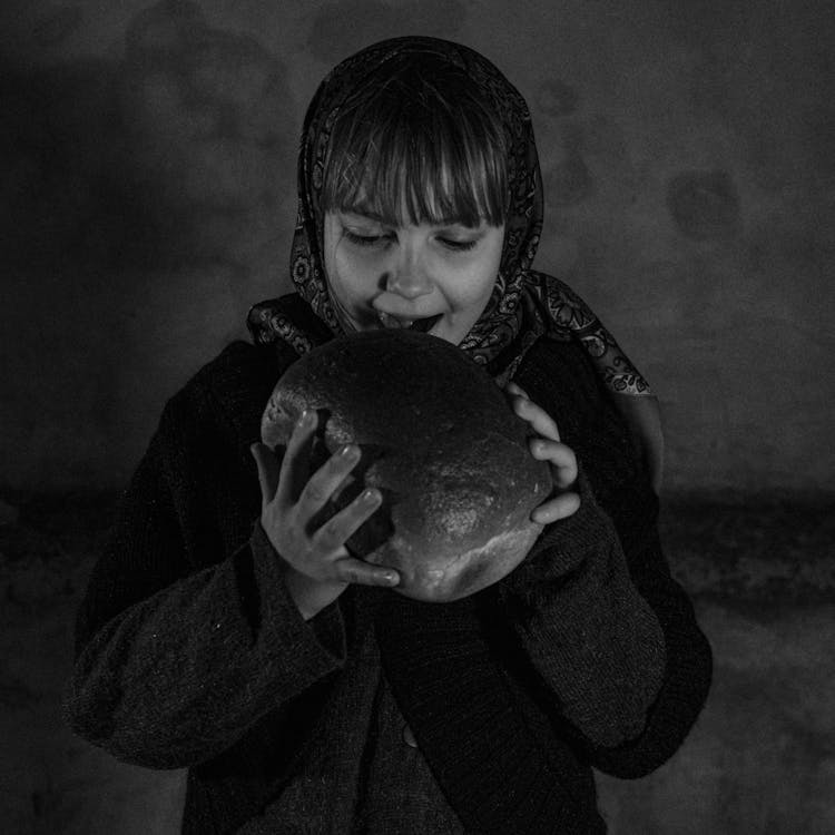 Girl Eating Bread