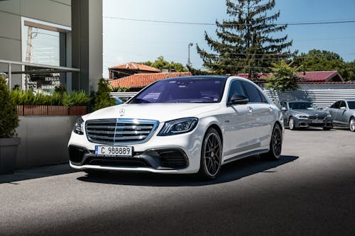 A White Mercedes-Benz S63 Parked on a Street 