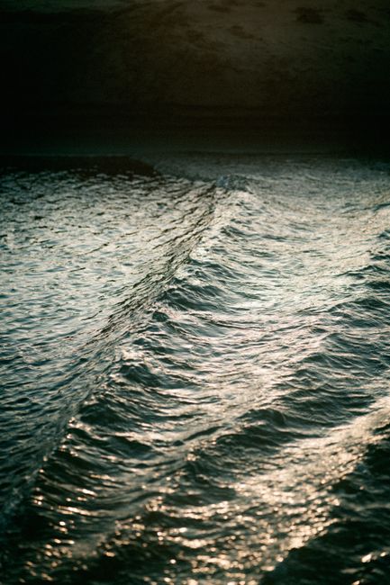 Peaceful ocean waves at dusk along the San Francisco coast, offering a tranquil view.