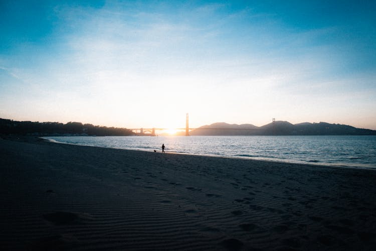 Sea Coast Of San Francisco With Golden Gate Behind At Sunset