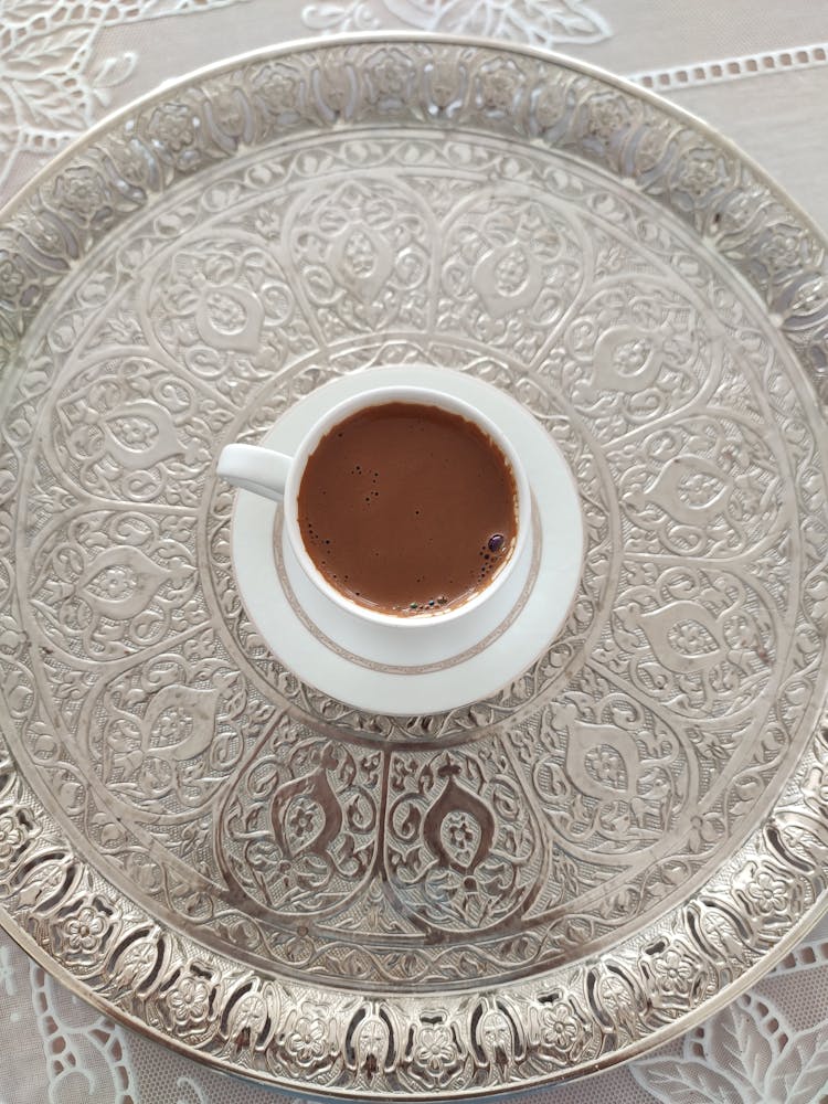 Cup Of Coffee On Ornate Silver Tray