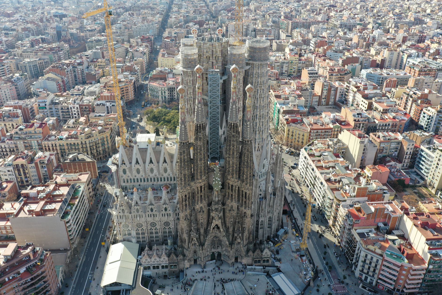 Stunning aerial shot of the iconic Sagrada Familia cathedral in Barcelona, showcasing its intricate architecture and surrounding urban landscape., Barcelona, Spain, stay connected here with a travel eSIM