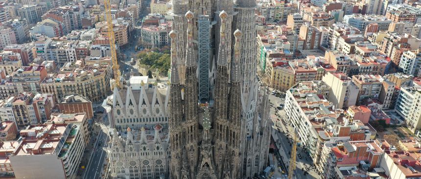 Stunning aerial shot of the iconic Sagrada Familia cathedral in Barcelona, showcasing its intricate architecture and surrounding urban landscape., Barcelona, Spain, stay connected here with a travel eSIM