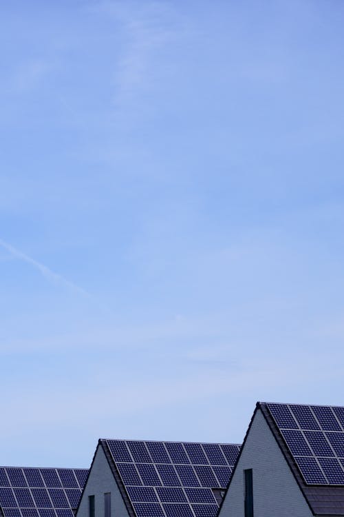 View of Houses with Solar Panels on the Roofs