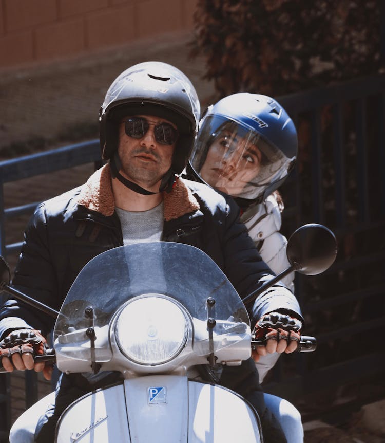 Couple On Vespa