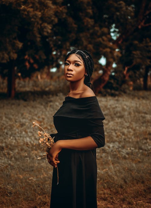 Portrait of Woman in Black Clothes