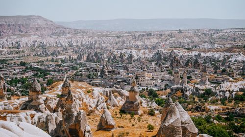 Free A breathtaking aerial view of Cappadocia's unique rock formations and landscape in Türkiye. Stock Photo