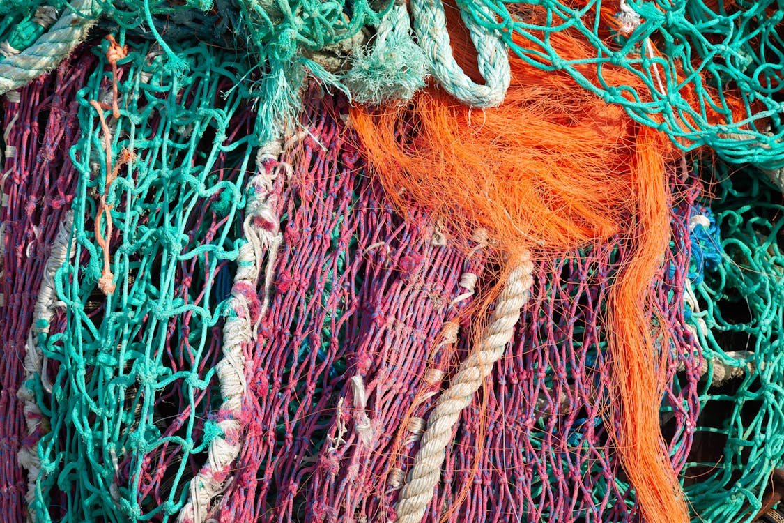 A close up of a pile of fishing nets · Free Stock Photo