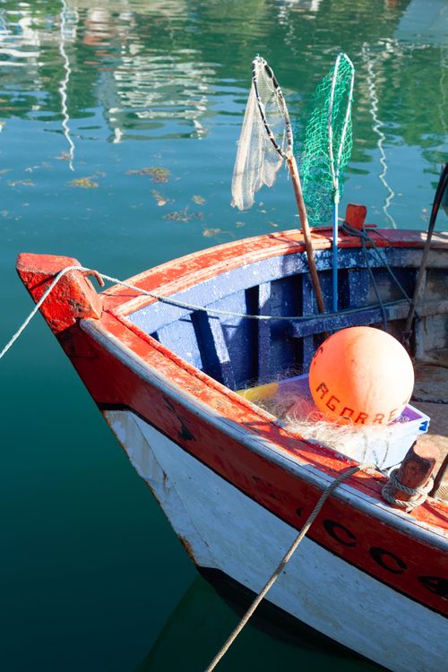 Free Vibrant close-up of a moored fishing boat in Clohars-Carnoët, France. Stock Photo