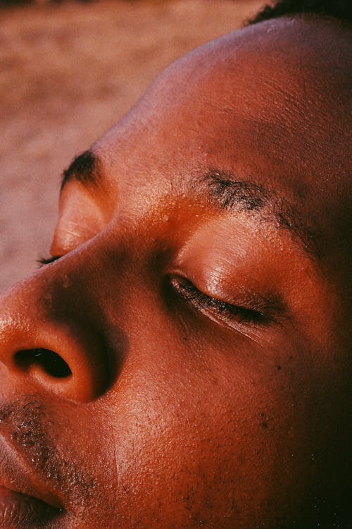 Close-up of a Face of a Man with Eyes Closed 