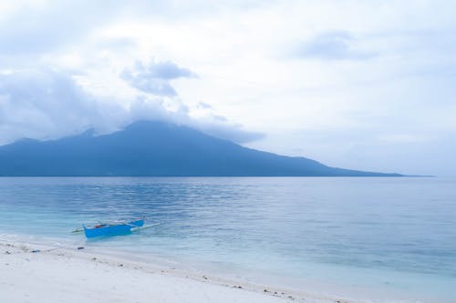 Free stock photo of boat, mountain, sand