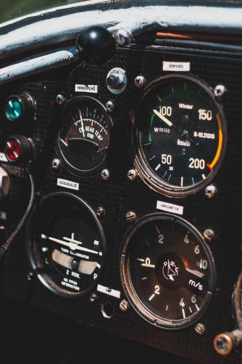 Free Detailed view of classic aircraft cockpit gauges and meters showing velocity and altitude. Stock Photo