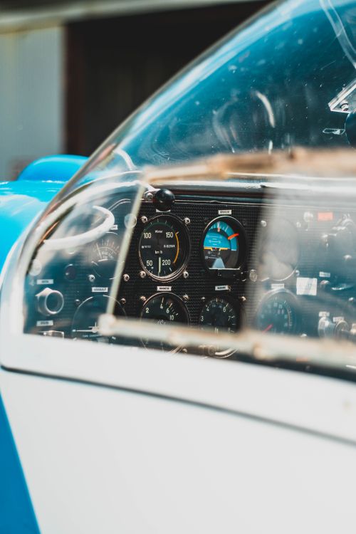 Free Detailed view of an aircraft cockpit showcasing instrument panels and controls. Stock Photo