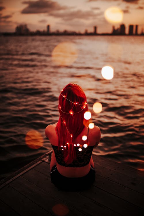Free Woman With String Lights On Her Body Stock Photo