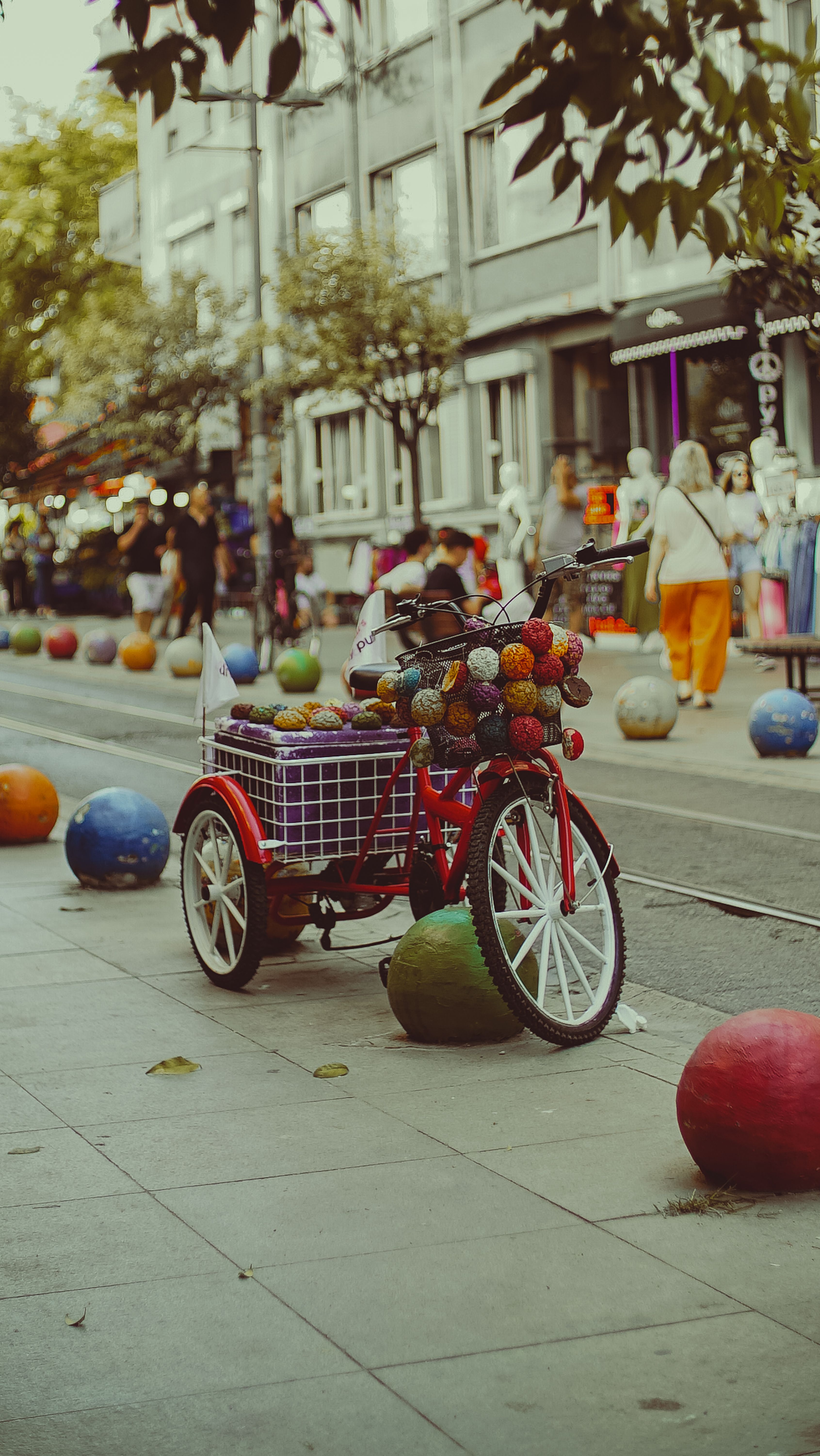 A Tricycle Parked on a Sidewalk with Colorful Decorations · Free Stock ...
