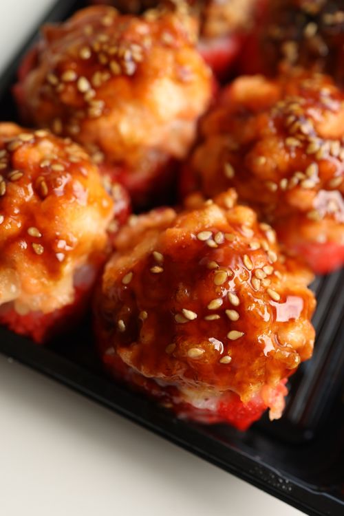 Free High angle view of savory stuffed tomatoes topped with a sesame glaze. Stock Photo